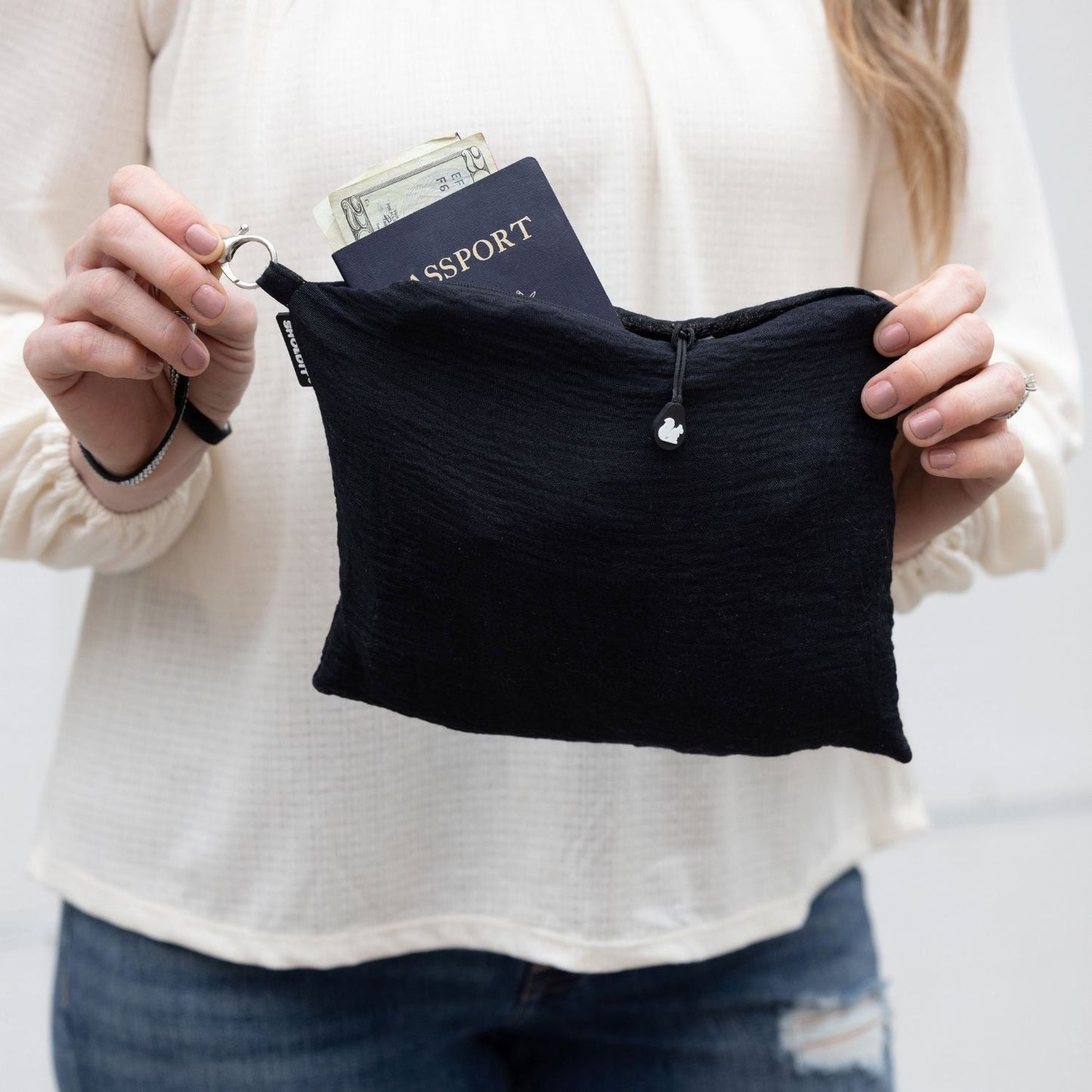 SHOLDIT Convertible Infinity Scarf with Pocket Peaceful Black shown as a clutch